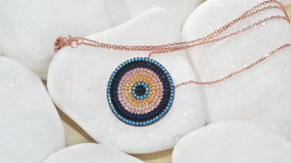 A pondering expression, questioning the true nature of the Evil Eye.