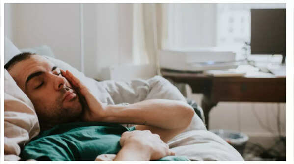 Man feeling the urge to urinate despite an empty bladder, emphasizing the deceptive nature of the symptom