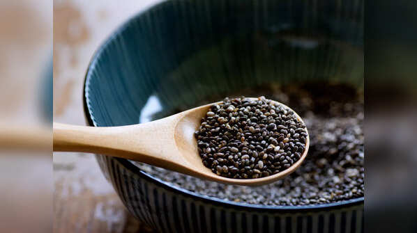 Sprinkling seeds into roti dough