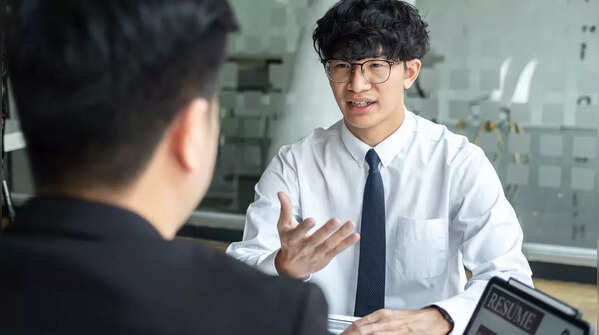 Professional maintaining good posture and eye contact during a video call