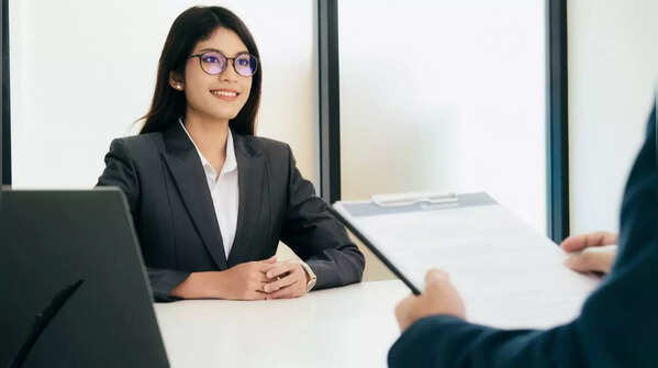 Person thoughtfully pausing before speaking