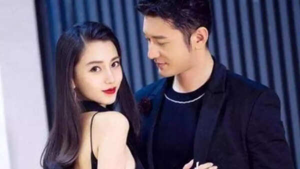 Angelababy and Huang Xiaoming at their wedding reception