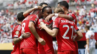 Benfica players celebrating a goal against Bayern Munich in the FIFA Club World Cup.