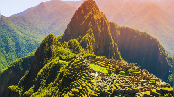 Aerial view of Machu Picchu nestled in the mountains