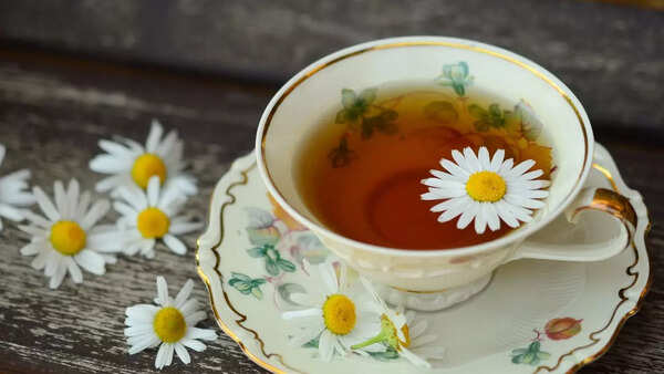 Steaming cup of soothing chamomile tea